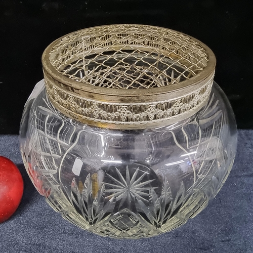 168 - A beautiful very large cut crystal bowl with diamond quilt detail and fan motif. Accompanied by a me... 