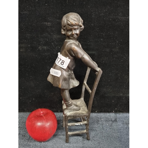 178 - A vintage heavy Bronze statue of a little girl balancing on a chair. A super quality piece and heavy... 