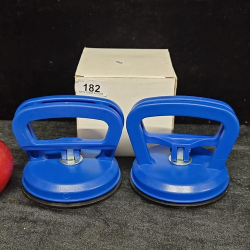 182 - A pair of high quality, retractable suction cups for glass removal.