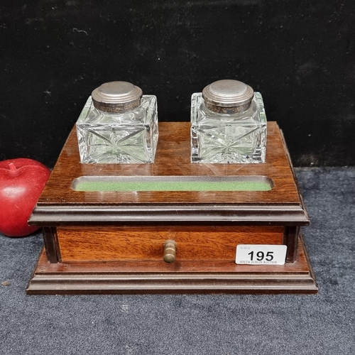 195 - A handsome Antique desk organiser with two cut crystal inkwells with silver plated lids, a pen rest ... 