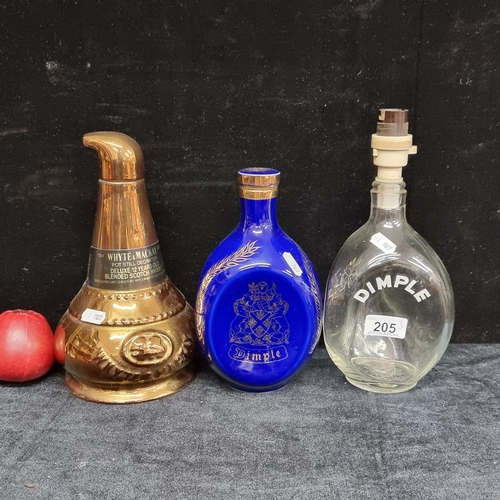 205 - Three items including a Dimple Whiskey Bottle, converted into a lamp base, an unusual Whyte and Mcka... 