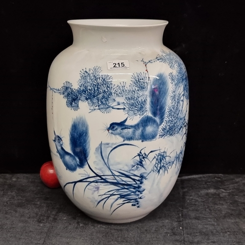 215 - A huge oversize urn shaped Chinese vase. Hand-painted with attractive nature scene featuring playful... 