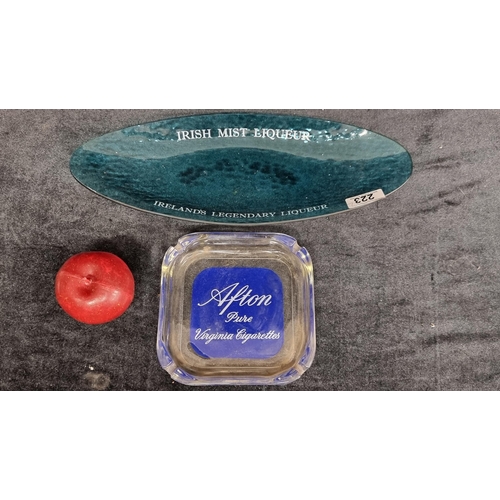 223 - Two items inlcuding a Sweet Afton Virginia Cigarette ashtray and an Irish Mist Liqueur nut dish in b... 