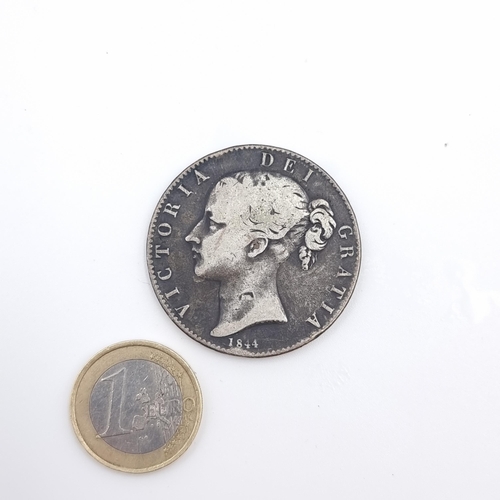 23 - A young bun head Victoria English crown, dated 1844 with a silver content of 92.5%. Weight of coin: ... 