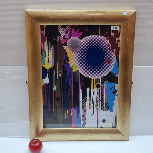 257 - A super cool vibrant abstract print housed in a heavy wooden gilt frame.