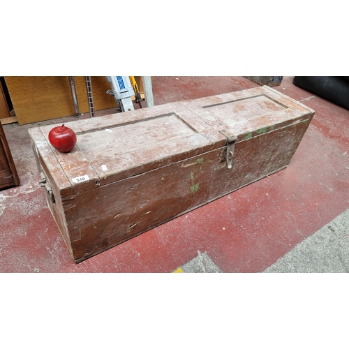 316 - A bipartite wooden chest, well constructed with steel locking mechanism and carry handles. Ideal for... 