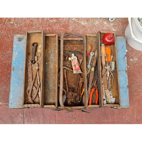 323 - A vintage accordion case tool box with a qty of tools.