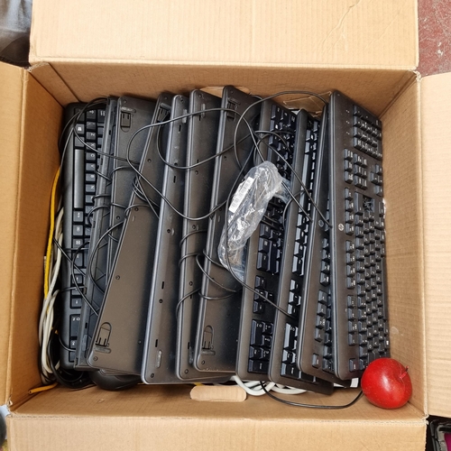 327 - A large box containing thirteen HP brand computer keyboards and multiple cables and computer mice.