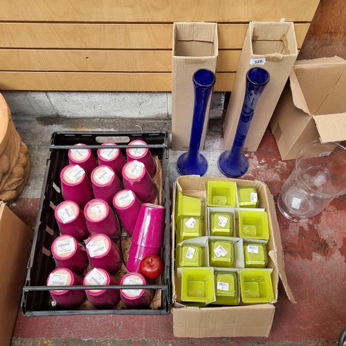 328 - A large quantity of plant pots including 24 lime green glass candle holders with 35 ceramic magenta ... 