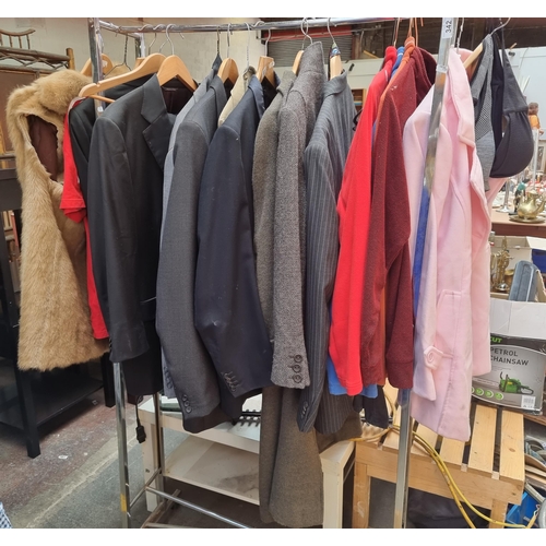 342 - A full rail of mixed clothing including Ted Baker and Louis Copeland jackets (not including the rail... 