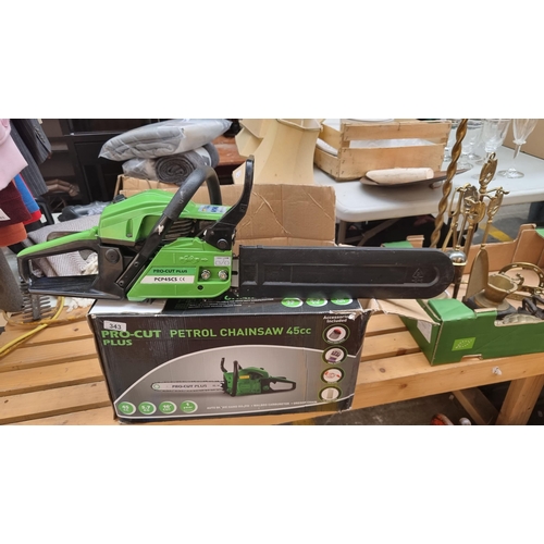 343 - A Pro-Cut Plus 16 inch chainsaw, Model: PCP45CS, in original box with blade sheath and instructions.... 