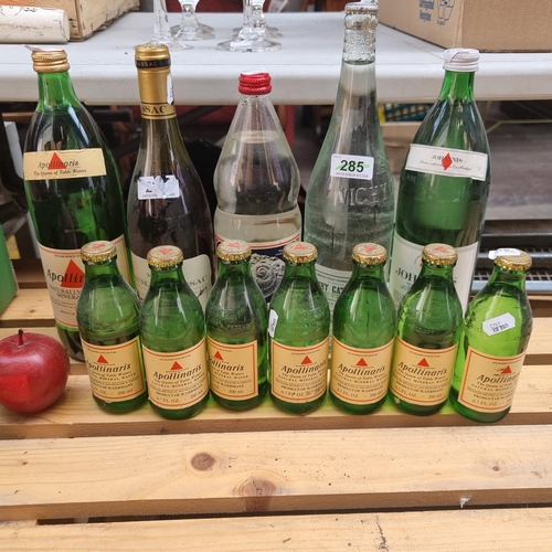 345 - Twelve sealed bottles, including Mas de Daumass Gassac, and bottles of vintage mineral water by Vich... 