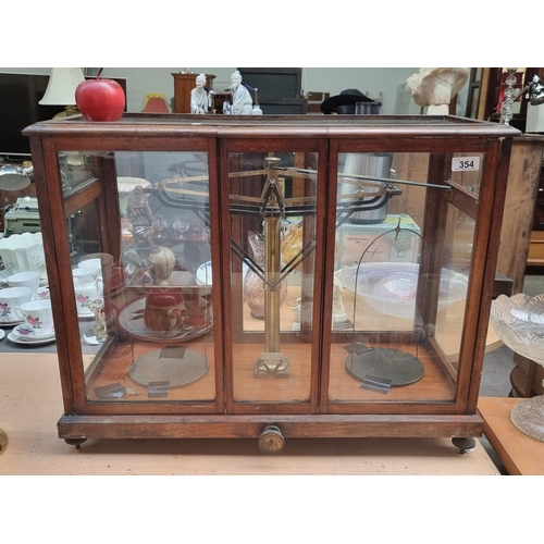 354 - Star Lot: A very handsome large example of an Edwardian apothecary scale, consisting of 