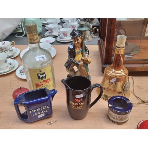 355 - A mixed lot of six vintage brewerymania, including a very collectible Martell Cognac water jug, an u... 