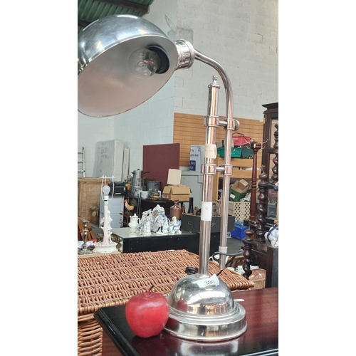 390 - A wonderful industrial style chrome desk lamp with retractable stem and large domed shade. Great cha... 