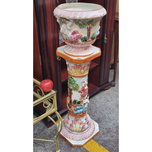 391 - A beautiful matching Capodimonte planter and pedestal stand. With large relief scenes of a Classical... 