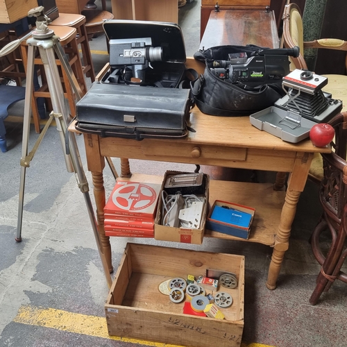 397 - A huge selection of vintage camera and photography equipment, including a 