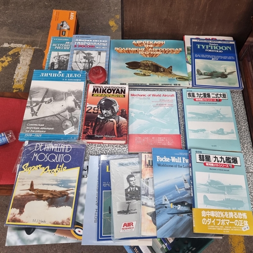 424 - A collection of 17 books on military aircrafts. Inc some very rare Japanese examples all in super co... 