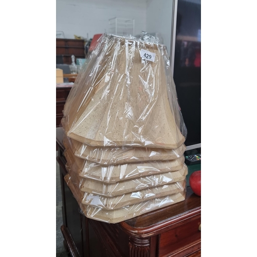 429 - 6 cream satin lampshades all new in the wrapper. €38 each RRP