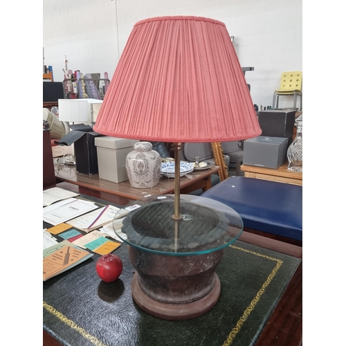 481 - A very nice handcrafted lamp, with a wooden base, glass top and pleated shade.