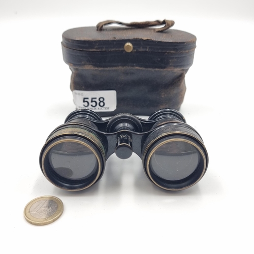 558 - A pair of quality military  glasses, with excellent optics. Comes in a vintage leather case.