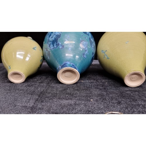 194 - Three stunning hand crafted ceramic bud vases with an irridecent crystaline glazing in light green a... 