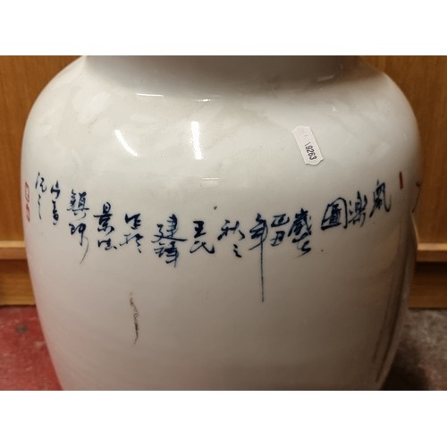 215 - A huge oversize urn shaped Chinese vase. Hand-painted with attractive nature scene featuring playful... 