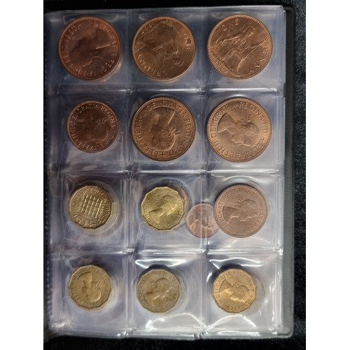 123 - A complete coin album filled with a large quantity of coins from a variety of locations. Including C... 