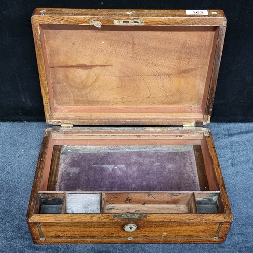 162 - A beautiful Victorian writing slope, with multiple writing compartments and with mother of pearl inl... 