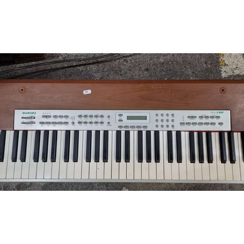 454 - A Suzuki SS100 88 key digital piano keyboard. Featuring 128 GM Stereo & 3D Instrument Sounds. Full s... 