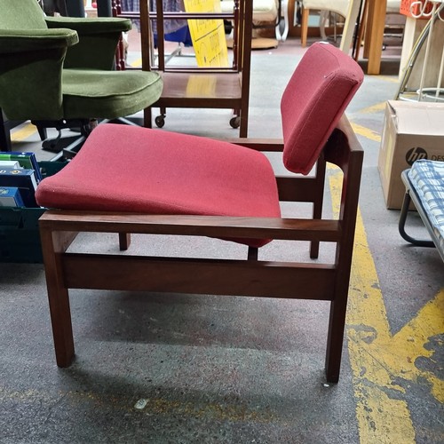 423 - A stunning mid century Danish easy chair with oak wood frame and angled seat upholstered in a red fa... 