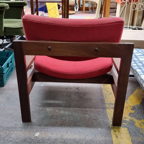 423 - A stunning mid century Danish easy chair with oak wood frame and angled seat upholstered in a red fa... 