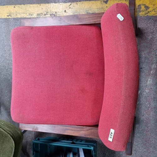 423 - A stunning mid century Danish easy chair with oak wood frame and angled seat upholstered in a red fa... 