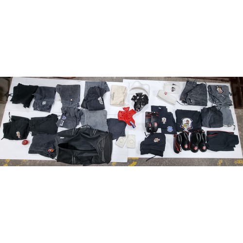 377 - Six karate suits sizes small to large in black and charcoal, includes tops and pants. With Kemp kara... 