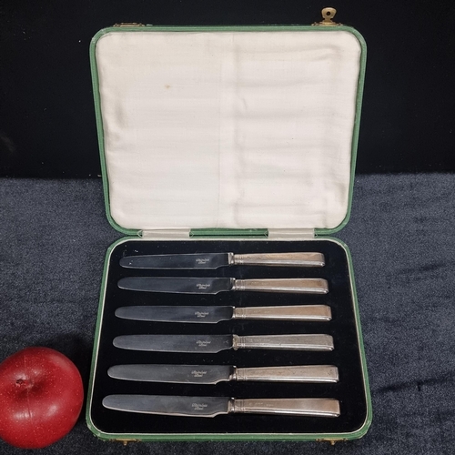 102 - A charming Art Deco canteen of six knives with sterling silver handles and stainless steel blades. H... 