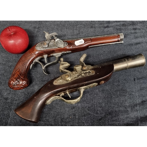 105 - Two replica Flintlock pistols including one Charles Vane example and a Blunderbuss. These are non fi... 