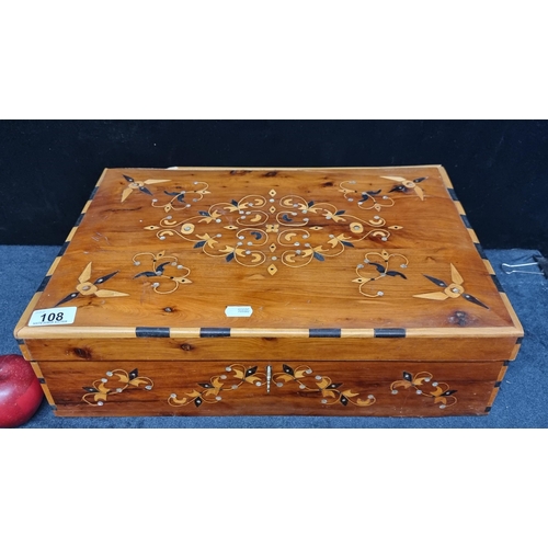 108 - A beautiful antique red cedar jewellery box. A large example with subtly domed lid and ebonised wood... 