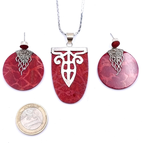 11 - A beautiful hand crafted suite of  Red Coral, consisting of a main inlayed pendant with silver chain... 