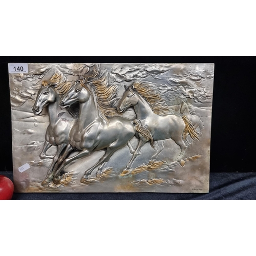 140 - A large sterling silver  sculpture of four galloping wild horses on a moor landscape. With high reli... 