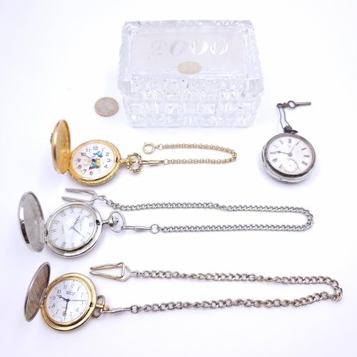 27 - A collection of four pocket watches, three with chains. This collection consists of a 