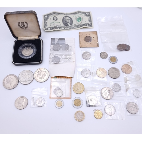 36 - A good collection of various coinage, together with a USA two dollar bank note.