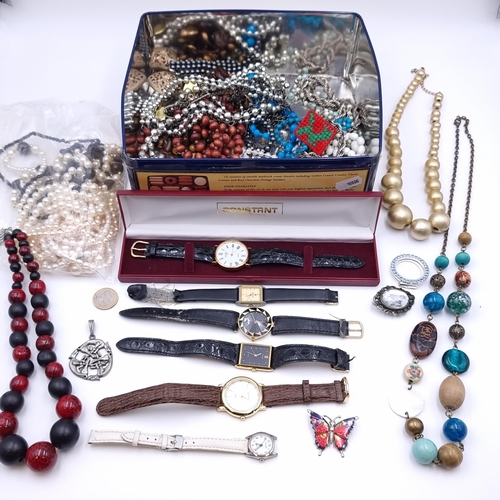39 - A very large collection of assorted costume jewellery and watches.