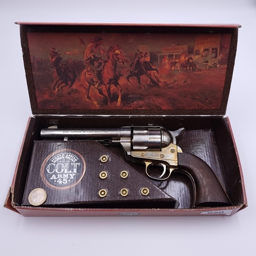 50 - A replica single action colt army 45 gun, with six bullets. Manufactured by Kolser. Item in as new c... 