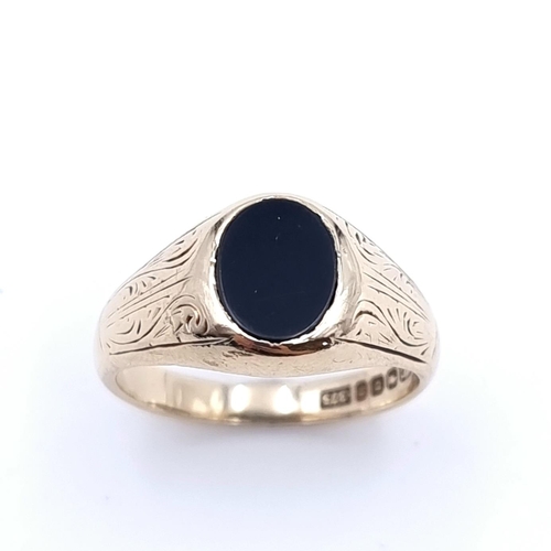 6 - A handsome example of a 9ct Gold Onyx signet ring, with attractive scroll detailing to surround. Rin... 