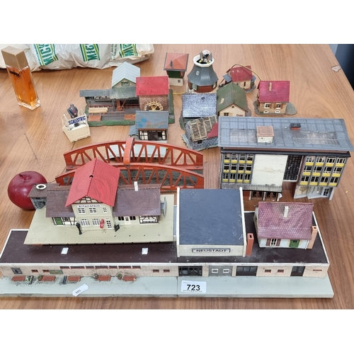 723 - A very charming fifteen piece model railway village by German brand Faller. Includes a railway stati... 