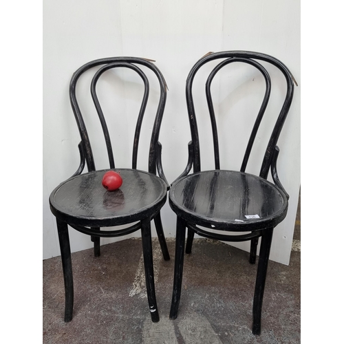 736 - A pair of vintage bentwood bistro chairs. They are super nice but could do with a little tidy up.