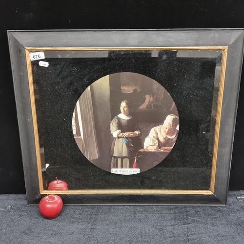 76 - A lovely wall hanging mirror featuring a vignette of Vermeer's 