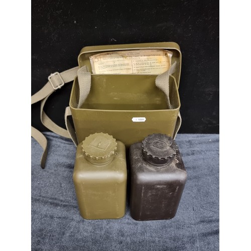 139 - German 1960s military decontamination set for land and water, with re-adjustable strap.