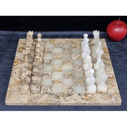 162 - A fantastic vintage marble and alabaster chess board, complete with a full thirty two matching chess... 