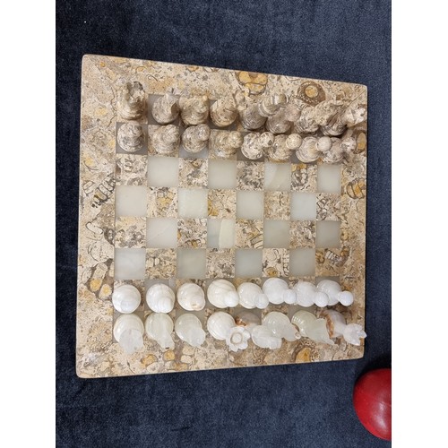 162 - A fantastic vintage marble and alabaster chess board, complete with a full thirty two matching chess... 